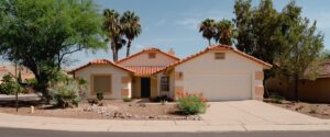A north phoenix home with a natural, desert landscape rather than a lawn.