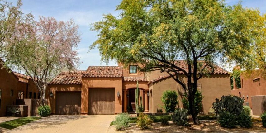 A stunning front yard in Anthem, AZ with native shade trees.